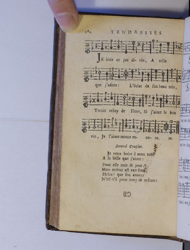 page 182 : Couplet : Je bois ce jus divin. / Je veux boire à mon tour.